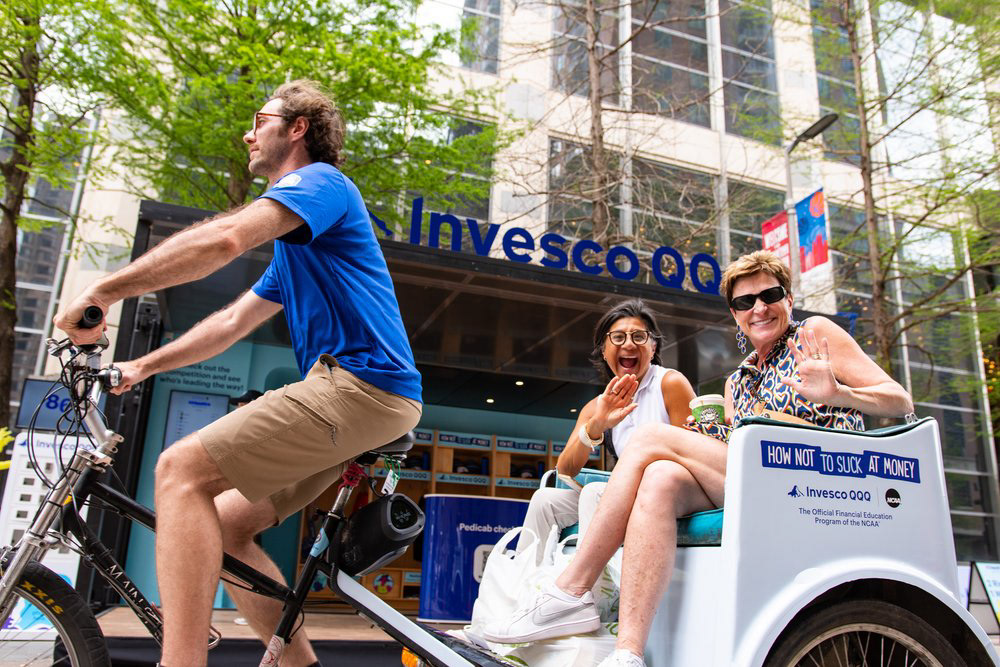 The How Not to Suck at Money pedicab activation in Houston